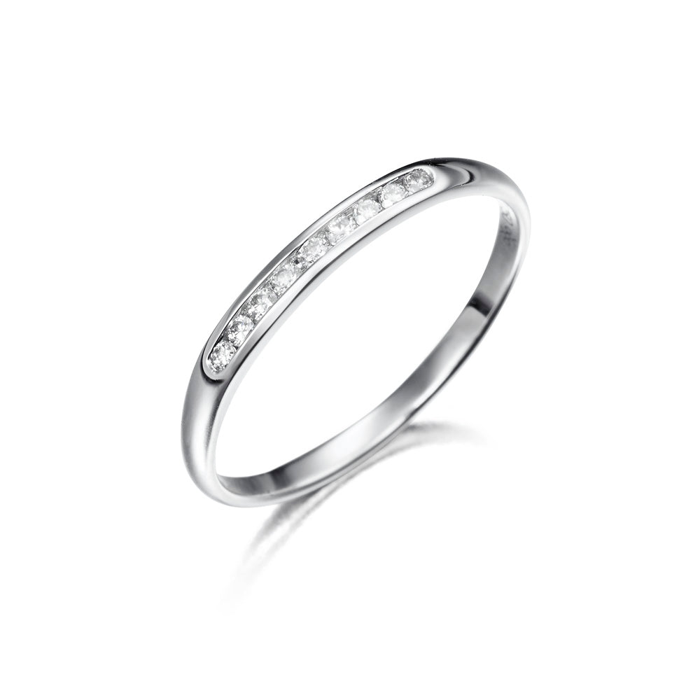 Media alianza oro 18K con diamantes 0,10cts en carril