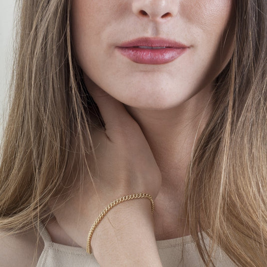 Pulsera barbada de oro 18K