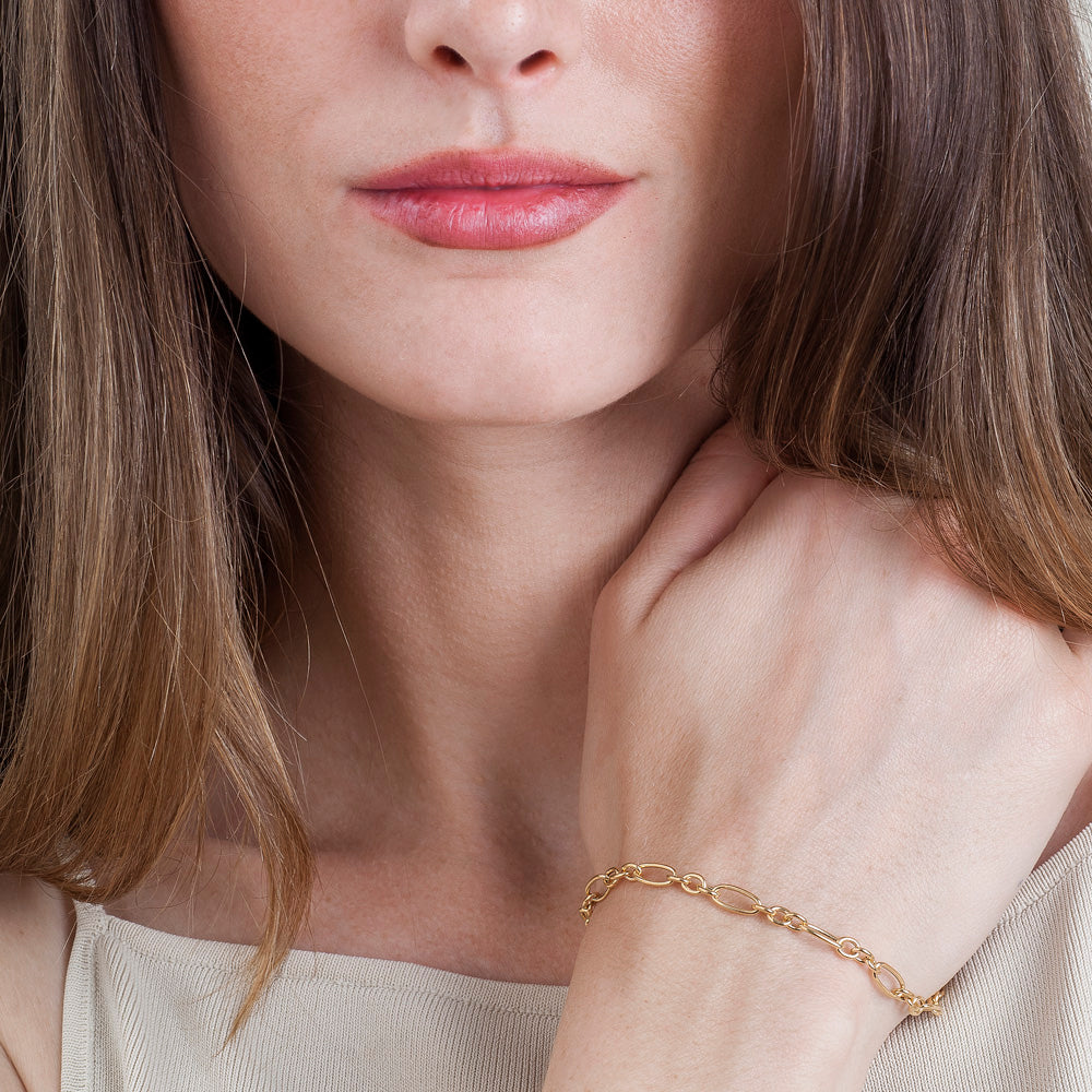 Pulsera de oro 18K estilo 3x1 de eslabones ovalados