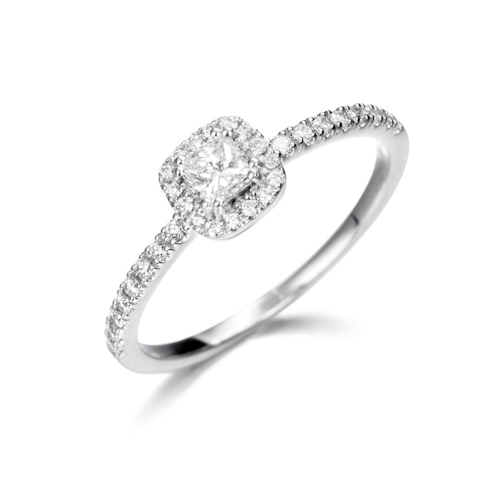 Anillo de oro blanco 18K con diamantes en orla 0.38cts