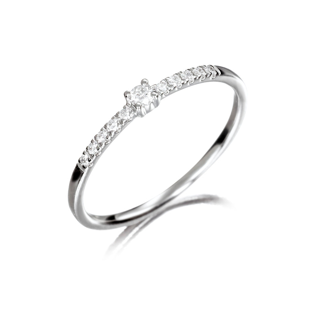 Anillo solitario de oro 18K con diamantes de 0.12 quilates
