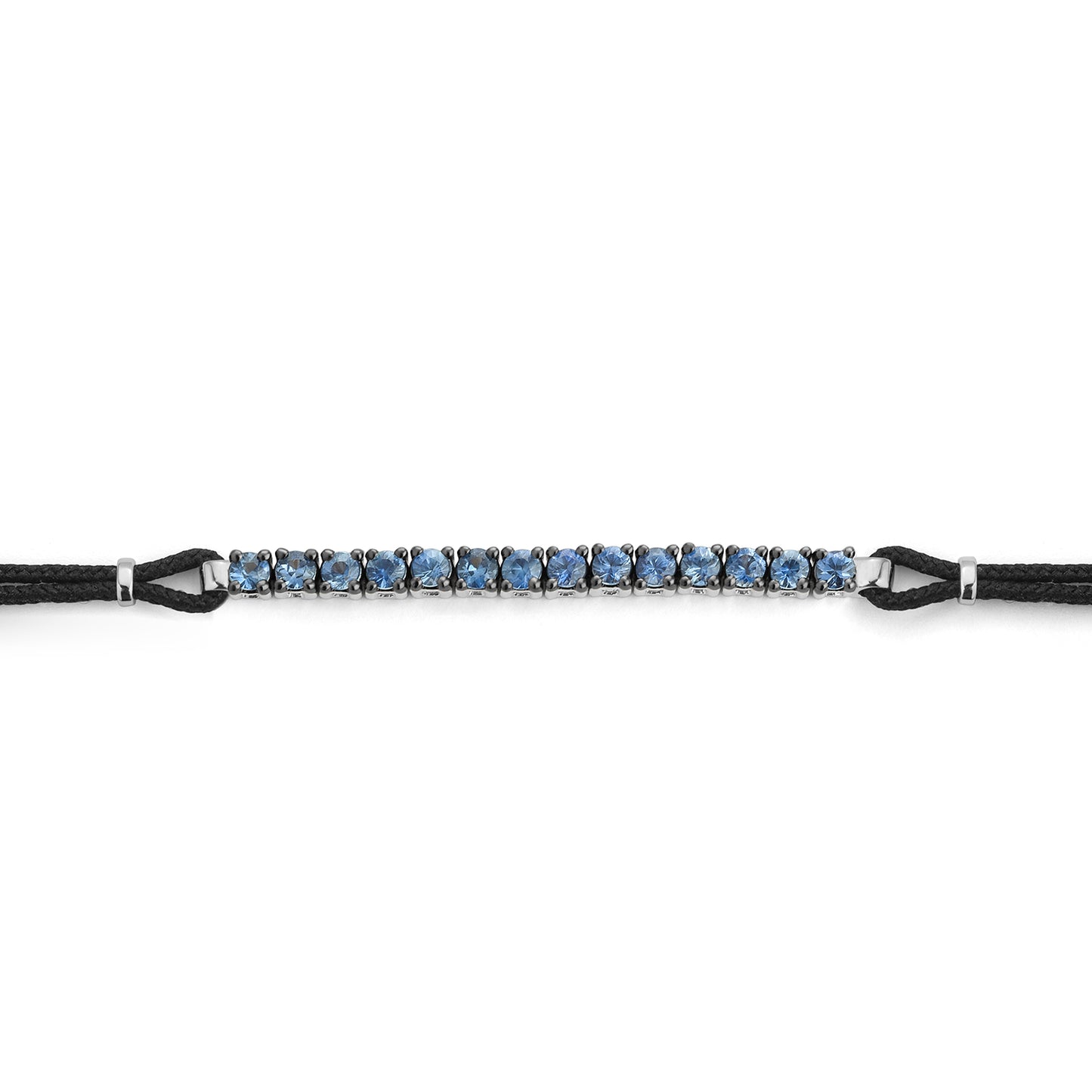 Pulsera tramo Rivière Oro blanco y zafiros azules
