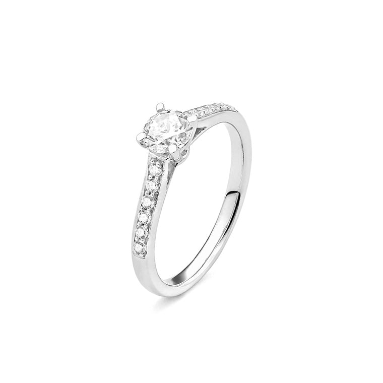 Solitario Acompañado en oro blanco 18K y Diamantes