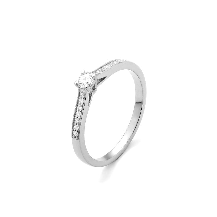 Solitario Acompañado en oro blanco 18K y Diamantes