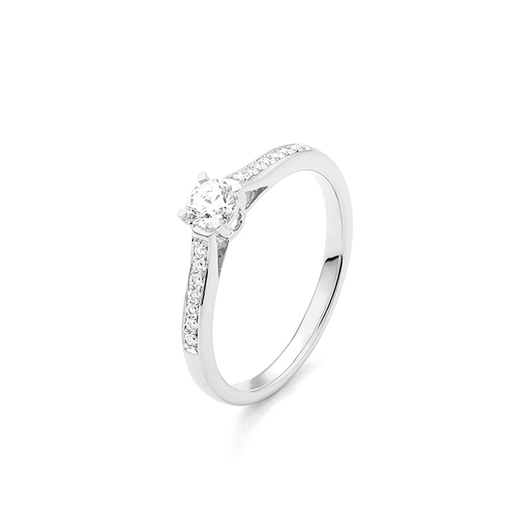 Solitario Acompañado en oro blanco 18K y Diamantes