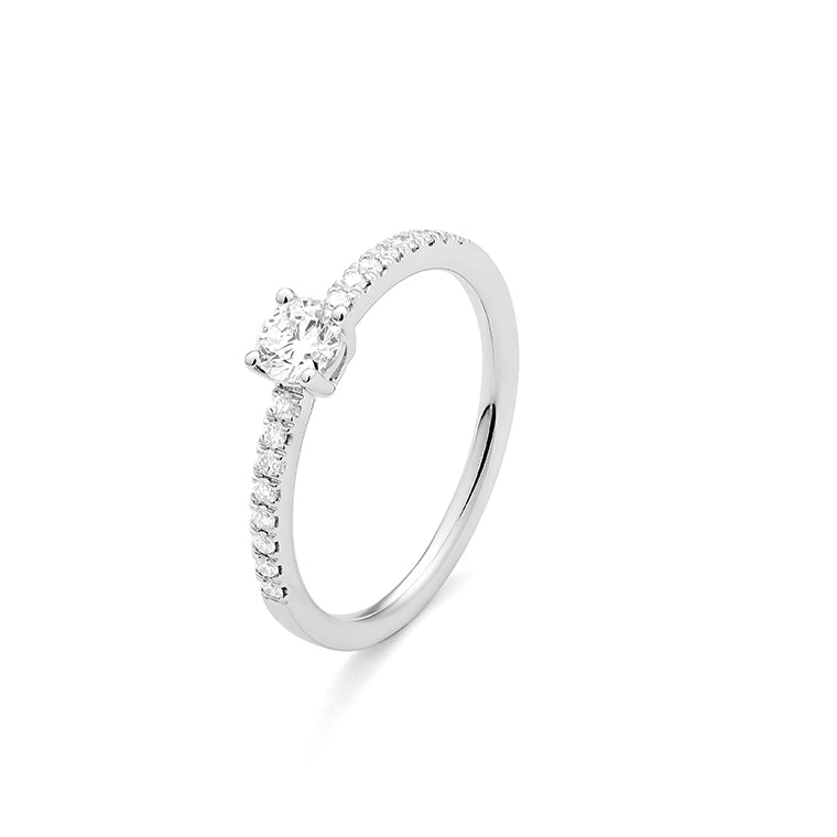 Solitario Acompañado en oro blanco 18K y Diamantes