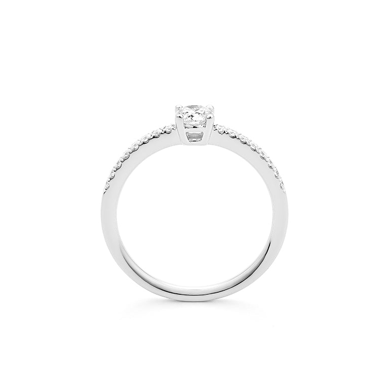 Solitario Acompañado en oro blanco 18K y Diamantes