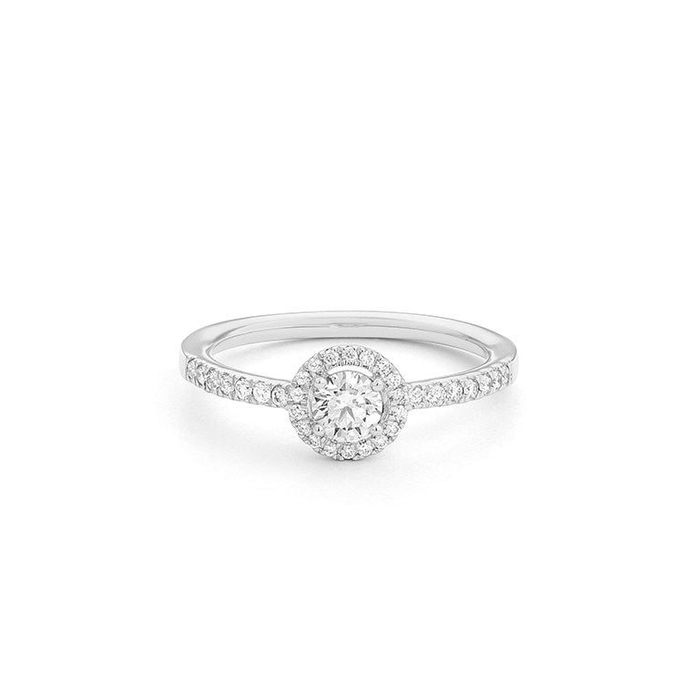 Solitario Acompañado con Orla en oro blanco 18K y Diamantes