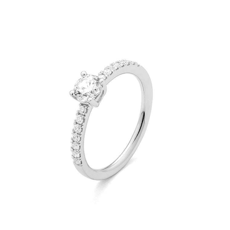 Solitario Acompañado en oro blanco 18K y Diamantes