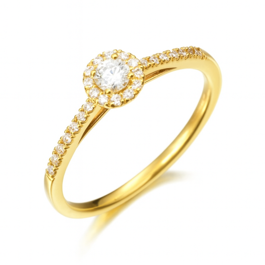 Anillo de oro 18K con diamantes en orla 0.26cts