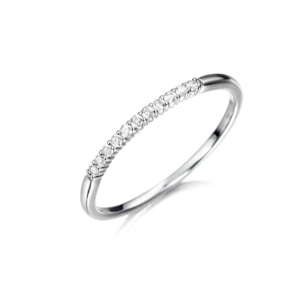 Anillo de oro 18K con diamantes 0.10cts en garra