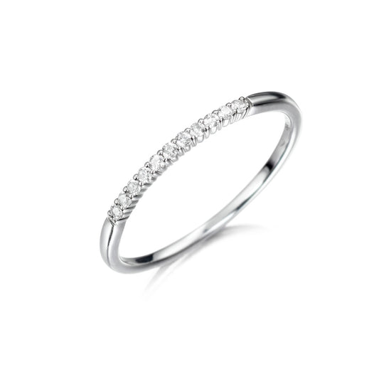 Anillo de oro 18K con diamantes 0.10cts en garra