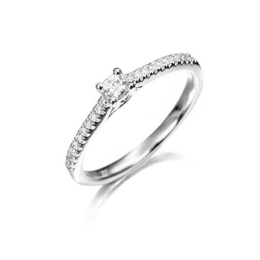 Anillo de oro 18K con diamantes 0.20cts en solitario con acompañamiento