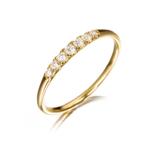 Media alianza de oro 18K con diamantes de 0.16 cts