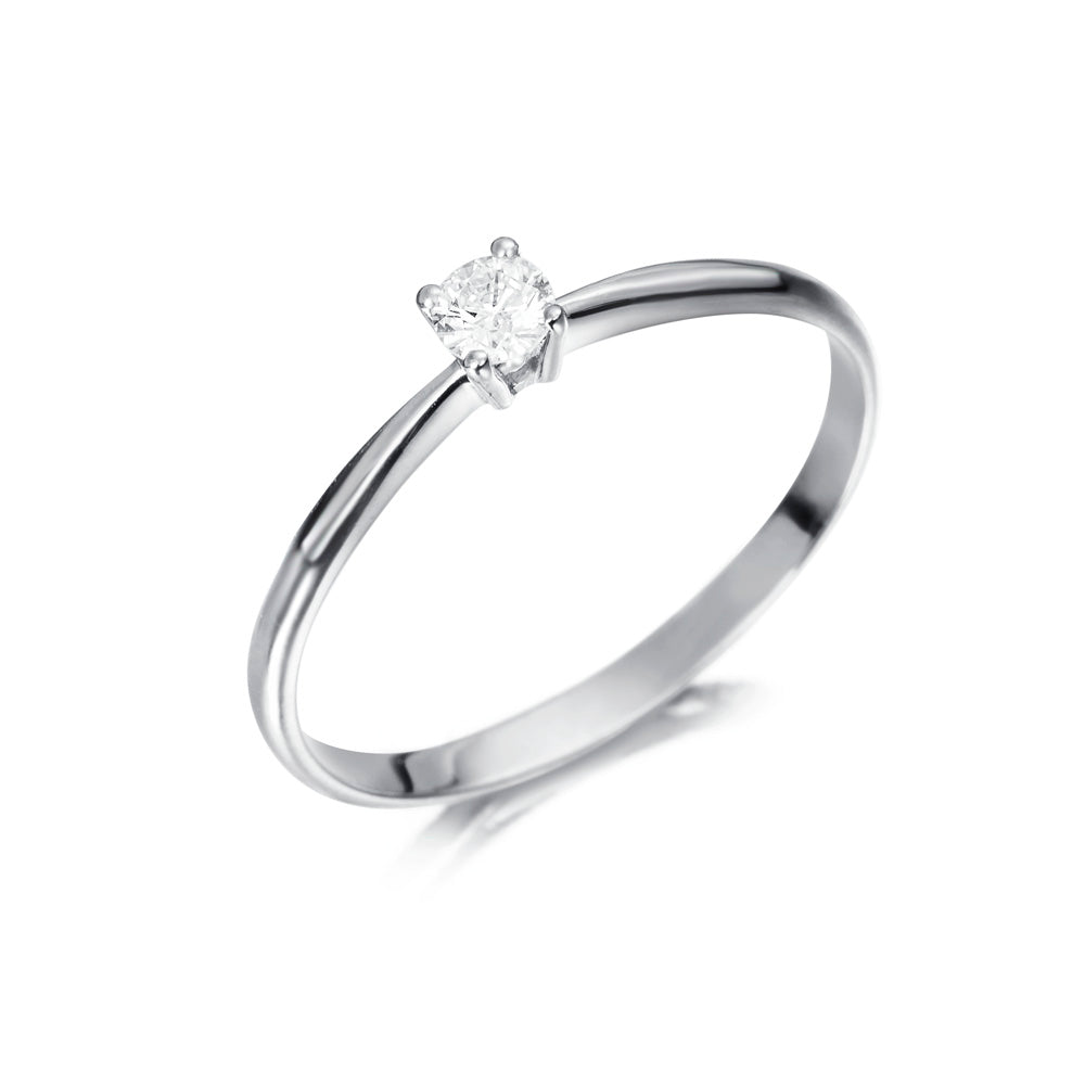 Anillo solitario de oro blanco 18K y diamante 0.12 quilates